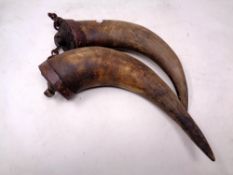 A pair of antique horn powder flasks.