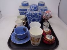 A tray containing assorted ceramics including Ringtons and Ironstone lidded caddies,