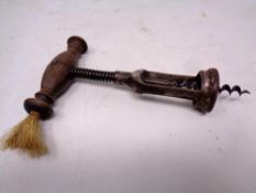 A vintage wooden-handled corkscrew.