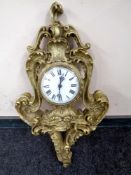 A French Rococo style wall clock (battery operated).