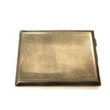 A silver cigarette / card case, Birmingham 1929 152.7g. 84 mm x 110 mm.