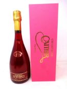 A bottle of Cattier rose champagne (boxed).