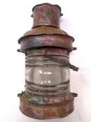 A 19th century copper ships lamp.