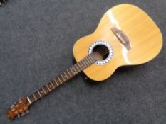 An Encore model ENC-2 electro-acoustic guitar.