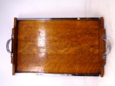 An oak and chrome Art Deco twin handled serving tray (length 40cm).
