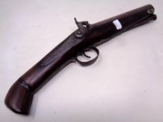 A 19th century percussion cap pistol (adapted from a cut-down sporting rifle)