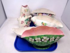 A tray containing six pieces of Maling Lustre china including a teapot, vases and a bowl.