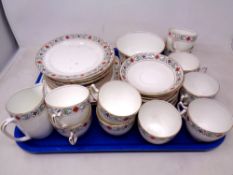 A tray containing 38 pieces of hand painted bone tea china.
