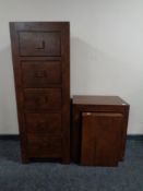 A Next Furniture narrow five drawer chest together with nest of two tables