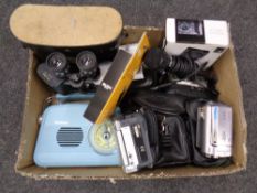 A box containing assorted digital and video cameras by Samsung and JVC, Goodmans retro style radio,