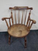 An Edwardian Ibex armchair.