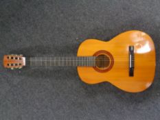 A Tatra classic acoustic guitar.