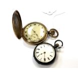 A gold plated full hunter pocket watch together with a silver fob watch.