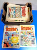 A box containing a quantity of late 20th century Dandy and Beano comics.