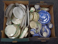 Two boxes containing antique and later dinnerware and tea china including willow pattern.