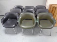 Nine mid-20th century office chairs upholstered in vinyl on metal legs.