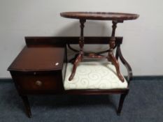 A mahogany Chippy telephone seat together with a further mahogany wine table.