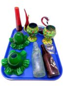 A tray containing assorted glassware including antique glass bottles, green glass light shades,