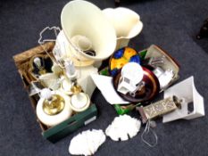Two boxes containing home furnishings including table lamps with shades, a wall mirror,