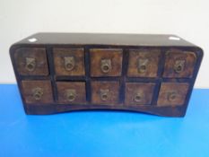 An eastern hardwood ten drawer chest.