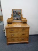 A Victorian walnut dressing table fitted with four drawers.