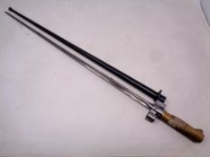 A French Lebel spike bayonet in sheath.