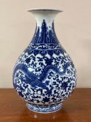 A Chinese blue and white porcelain vase, dragon decoration, base marked in underglaze blue,