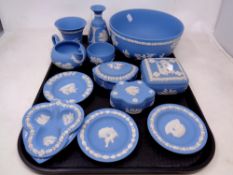 A tray containing 13 pieces of Wedgwood blue and white Jasperware.