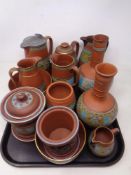 A tray containing 13 pieces of terracotta pottery including jugs and vases etc.