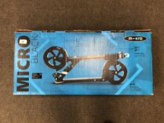A Micro Scooter, Black Edition, brand new, boxed and never used.