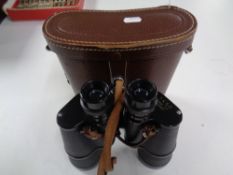 A pair of 7x50 field glasses No.22427 in leather case.