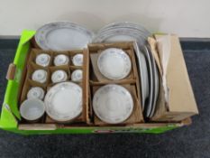 A box containing a Japanese Diane porcelain tea and dinner service.