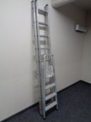 A Hailo twin section aluminium extension ladder together with a further set of Beldray aluminium