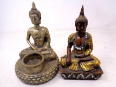 Two contemporary Buddha figures one with tea light holder.