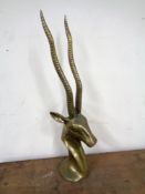 A brass gazelle head (height 52cm).