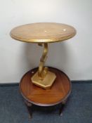 A contemporary gilt occasional table together with a further circular mahogany coffee table.