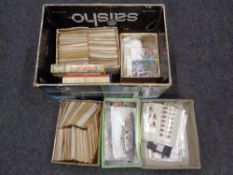A box containing a vast quantity of loose world stamps, stamps in envelopes etc.
