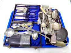A tray containing assorted plated wares including assorted cutlery, serving spoons, ladle,