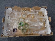 A box containing a quantity of drinking glasses.