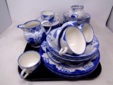 A set of 34 pieces of Poole pottery hand painted blue and white tea and dinnerware.