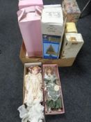 A box containing a quantity of collector's dolls.