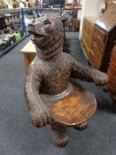 A composition armchair in the form of a bear