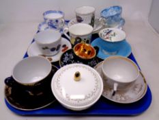 A tray containing nine assorted china teacups and saucers including Royal Doulton, Aynsley,