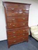 A late George III mahogany and pine eight drawer chest on chest