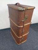 A wooden bound shipping trunk.