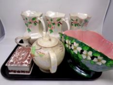 A tray containing seven pieces of Maling including teapot, lidded trinket pot, vases and jugs.