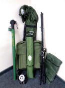 A box containing fishing equipment including two Carp rods with reels, rod bag, rod stands,