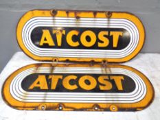 Two Atcost enamelled signs.