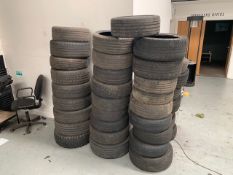 Approximately 58 car tyres, various sizes and manufacturers.