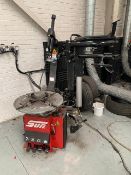 A Snap-On Sun Model STC 5325 Tyre Changer.